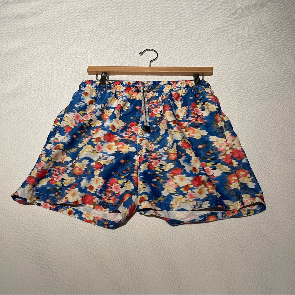 Blurred flower design and pattern in blue background.